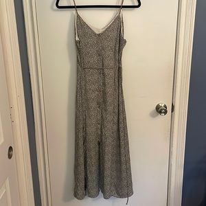 Black and cream, spaghetti strap dress. Buttons and tie.